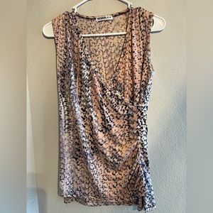 Sleeveless faux wrap top.  Never worn.
